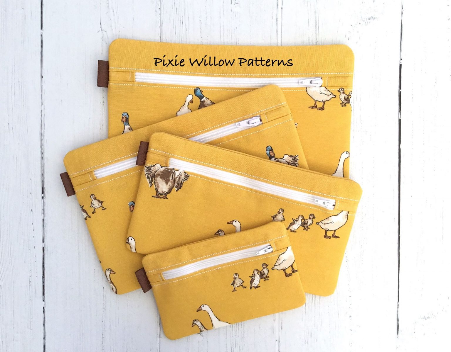 ITH Standard Zipper bag with tab tops, in 4 sizes. Machine embroidery