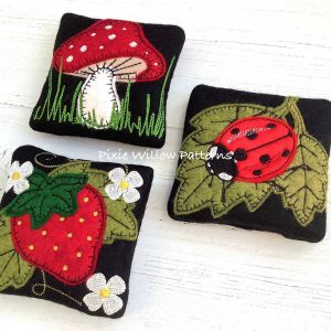 In the hoop pin cushion pattern. Set of 3 embroidery machine pin cushion designs with ladybird, toadstool and strawberry.